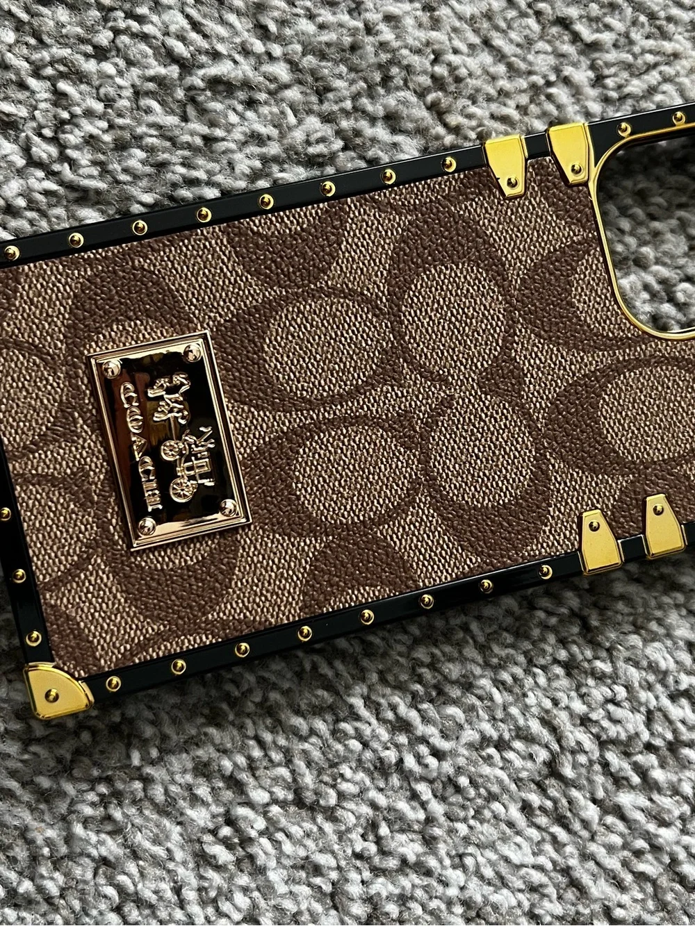 Coach Brown Signature Canvas Trunk Phone Case with Gold Hardware
